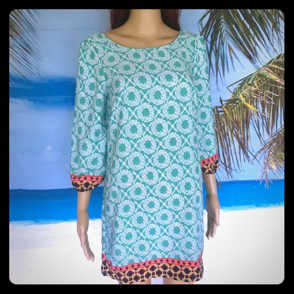 Green shift dress with trim accent details